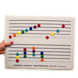 Teach children how to read music with felt staff