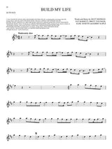 Sheet music for alto saxophone with lyrics and musical notation on a white background