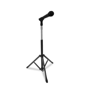 A black Manhasset Concertino microphone stand with an adjustable height mechanism and a boom arm for holding a microphone.