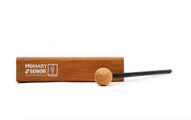 A Sonor brand woodblock made of Pao Rosa wood with a mallet, displaying the brand logo on the side.