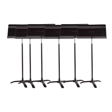 A set of six black Manhasset orchestral music stands with adjustable desks and a tripod base.