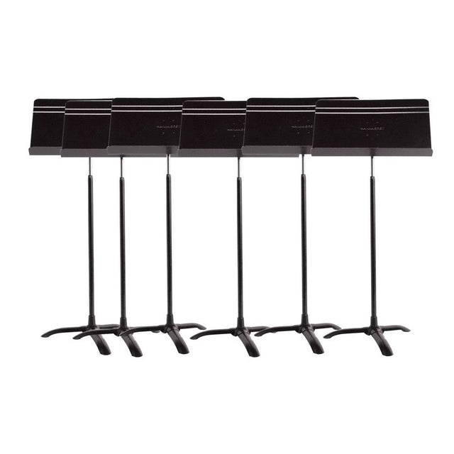 A set of six black Manhasset orchestral music stands with adjustable desks and a tripod base.