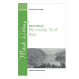 A book cover for 'My Country 'Tis of Thee' by Mack Wilberg, featuring an illustration of a calm lake and distant mountains.