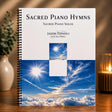 Music book titled 'Sacred Piano Hymns' by Jason Tonioli on a wooden surface with a decorative background.