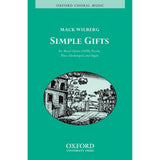 Cover of the sheet music book 'Simple Gifts' by Mack Wilberg, arranged for SATB, piccolo, flute, glockenspiel, and organ. The cover features a green background with a black and white illustration of a rural scene, including a house and trees.